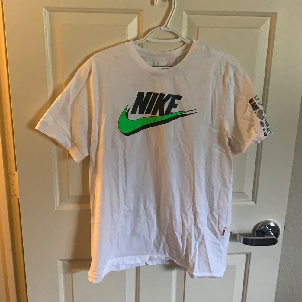 Nike white tee. Slightly worn but cool design!